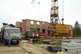 Construction of four-storey 24-apartment building for factory employees commenced. Photo №1